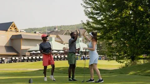 A group of people enjoying their time at Monterra Golf