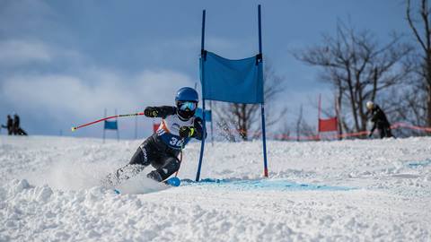 Skier from Blue Mountain racing during Tremblant Race Camp