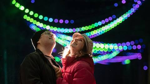A couple exploring AGORA: Path of Light