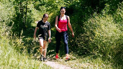 a mother and daughter hiking in The Explore Park