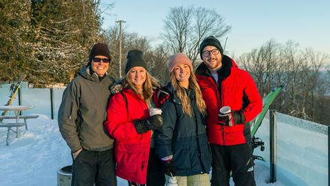 A group enjoying the sunrise at the The North Face Sunrise Climb at Blue Mountain Resort