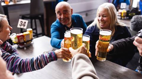 A group having drinks at Bullwheel Pub
