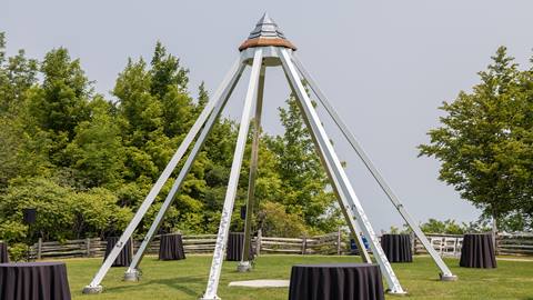 a white structure with a black table in the middle at Blue Mountain Resort