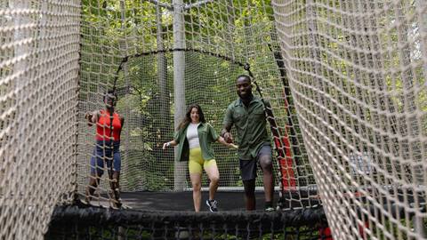 A group of people enjoying the Canopy Climb at Blue Mountain Resort
