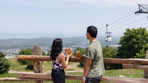 Couple enjoying their drinks at Blue Mountain Summitview