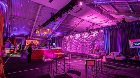 A stage with purple lights