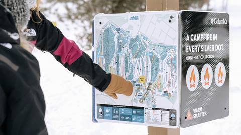 Person pointing at Blue Mountain Map