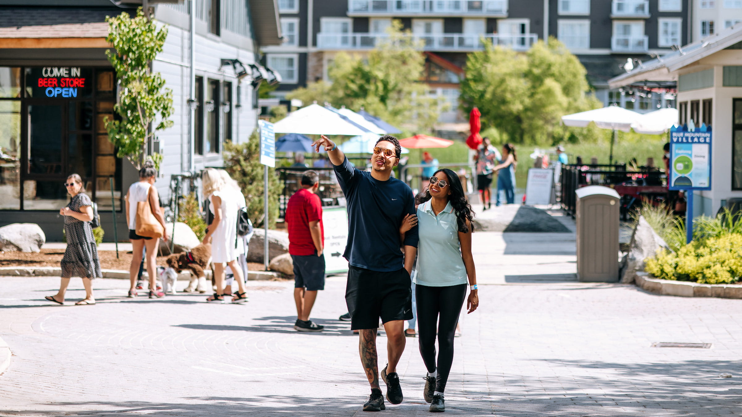 Couple walking through the village in Blue Mountain 