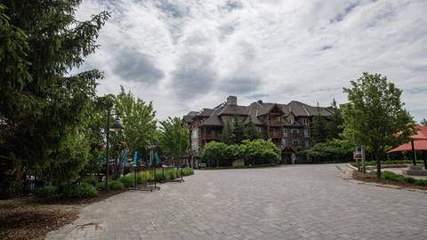 Blue Mountain Village with Mosaic Hotel in background during summer