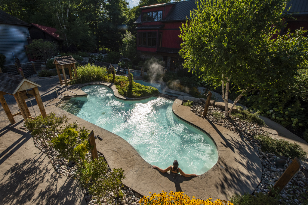 Person in hot tub at Scandinave Spa at Blue Mountain Resort