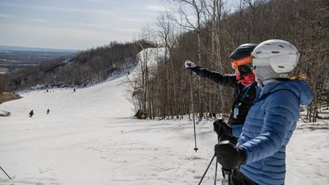 Friends on hill at Blue Mountain enjoying spring skiing