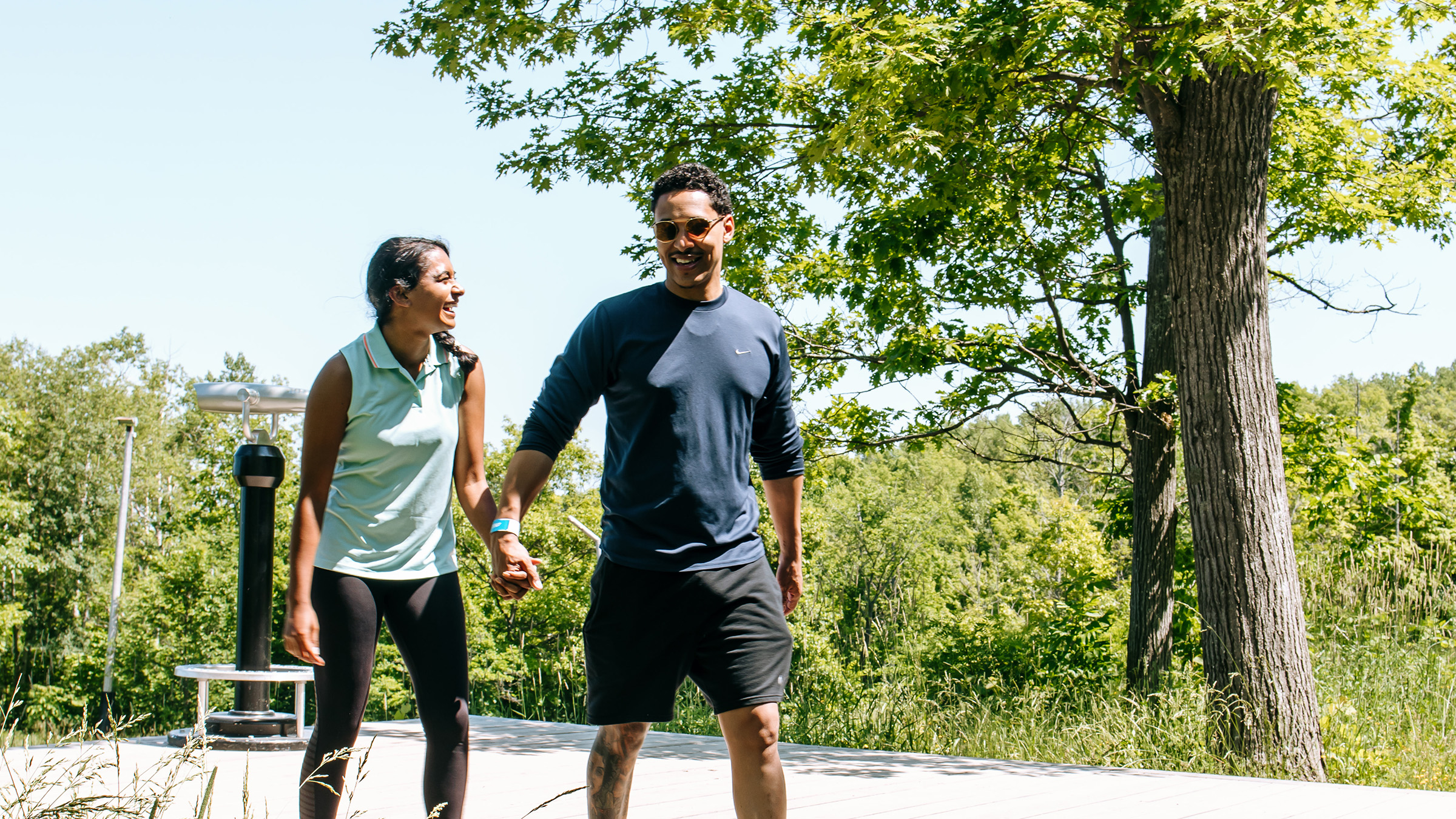 Couple walking from viewing platform at the top of Blue Mountain