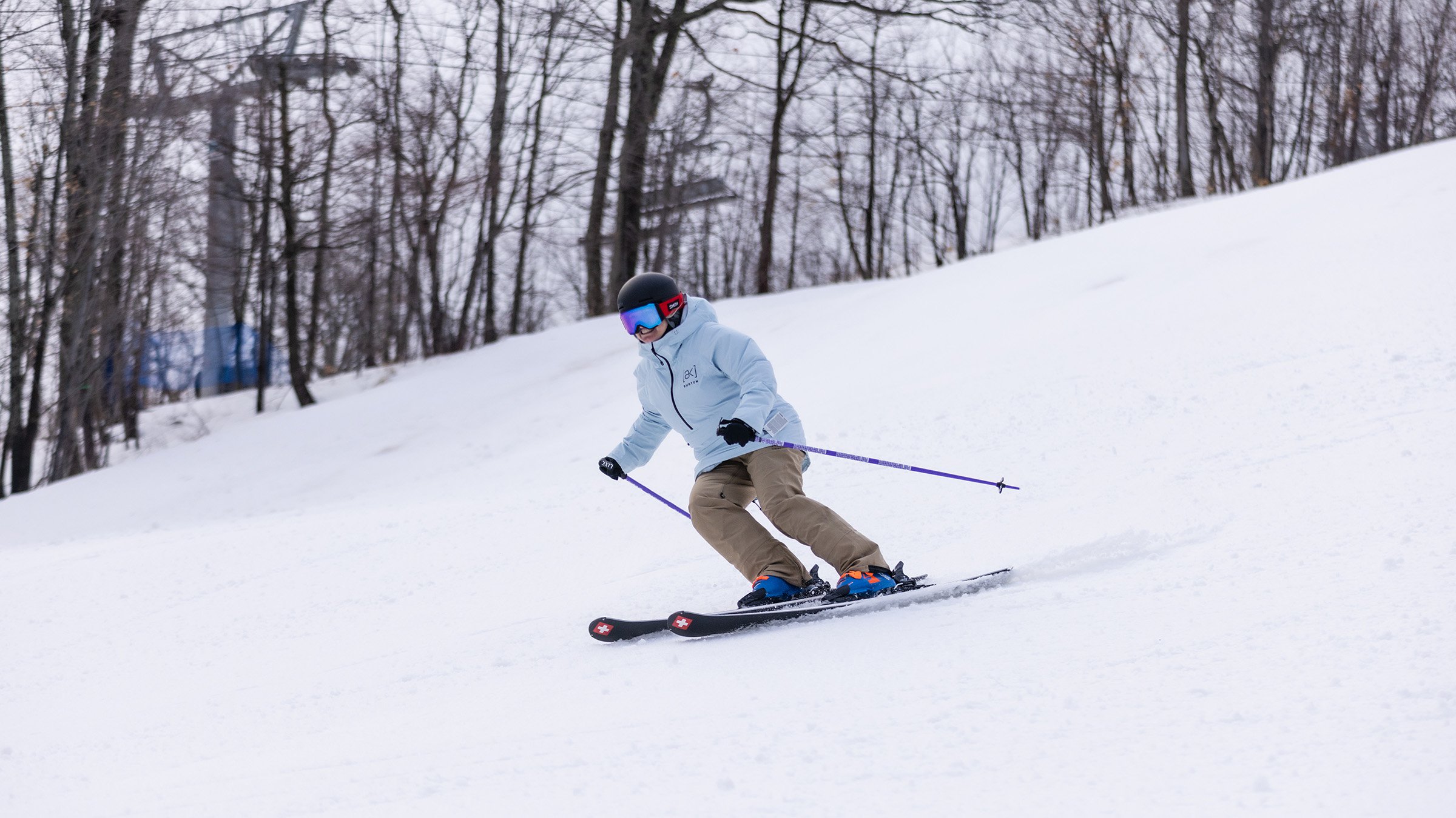 Person skiing down run at Blue Mountain