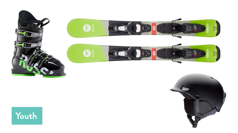Lay flat of Youth skis, boots and helmet