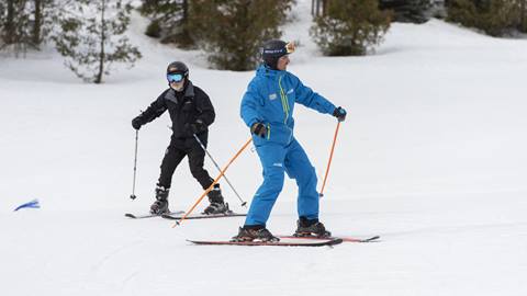 New skier learning how to ski with instructor at Blue Mountain