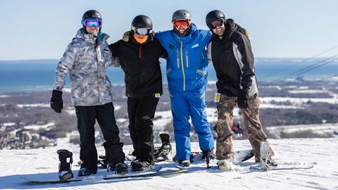 Group of learners at Blue Mountain during Adult Advanced snowboard multi-week programs 