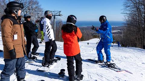 Group of learners at Blue Mountain during Snowboard Instructor in Training multi-week programs 