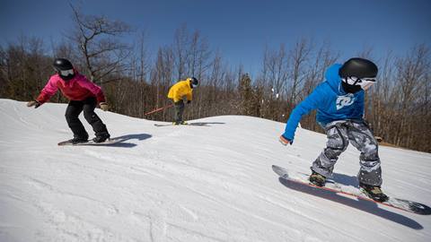 Skiers riding during Christmas Cross Camp at Blue Mountain