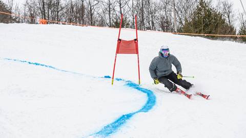Skier racing during Christmas Masters Race Program at Blue Mountain