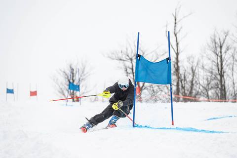 Skier racing during Masters Race Program at Blue Mountain