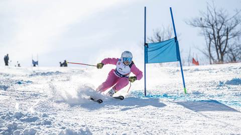Skier racing during U16 Race Program at Blue Mountain