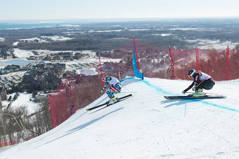 Skiers racing during Ski Cross Program at Blue Mountain