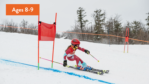 Skier going down Blue Mountain during U10 Race Program