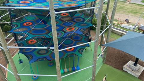 an image displaying the 3 tier cocoon crawl climbing net at blue mountain resort