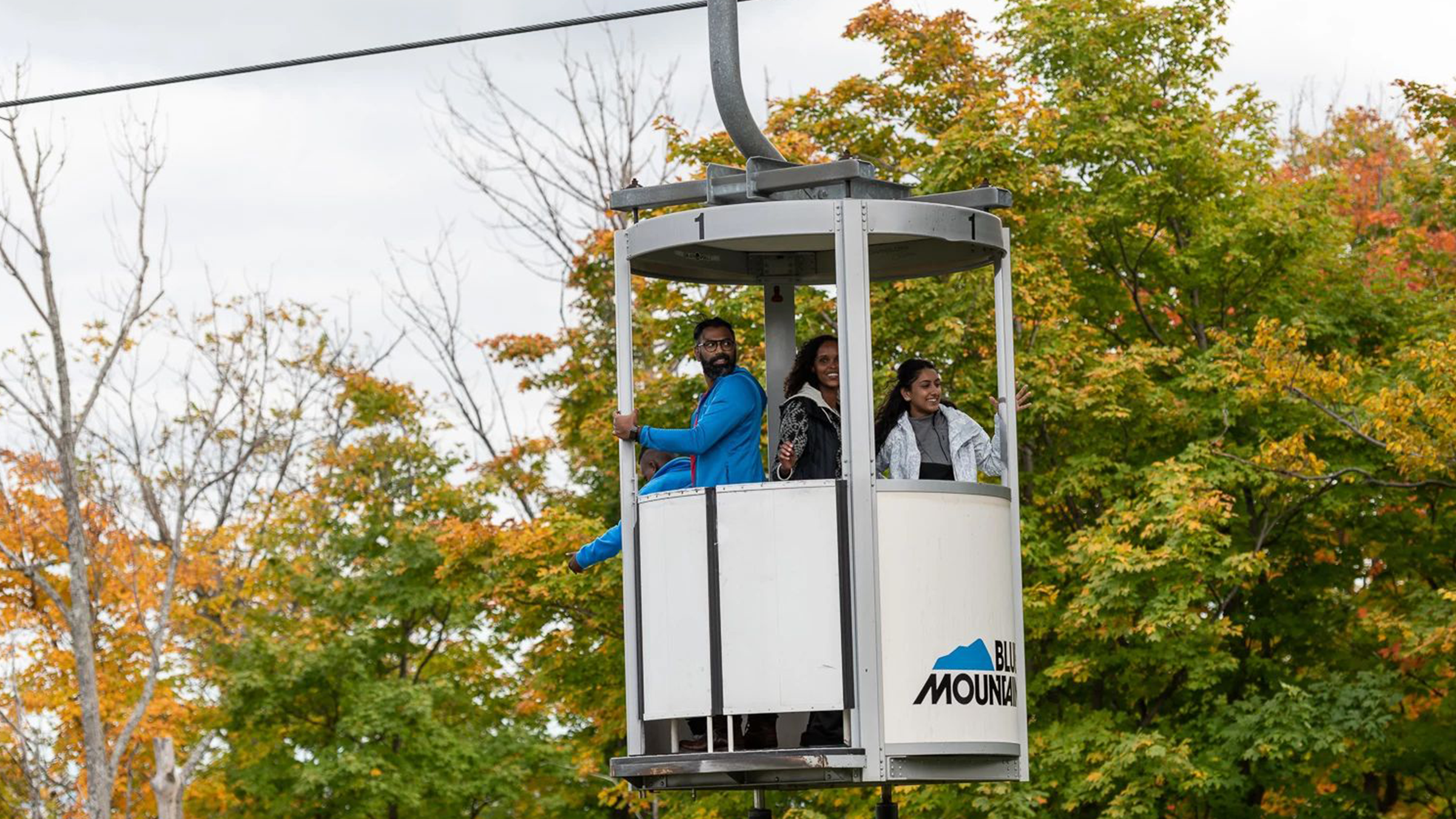 Family on Gondola at Blue Mountain in Fall