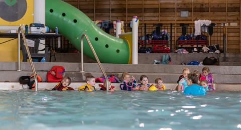 Children swimming at Plunge! inside pool at Blue Mountain Resort