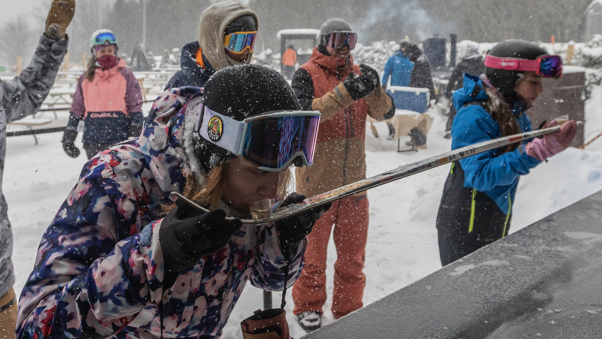 Friends doing a shot ski at Off Piste at Blue Mountain
