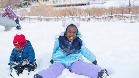 Two Children Playing in the snow at Blue Mountain Resort