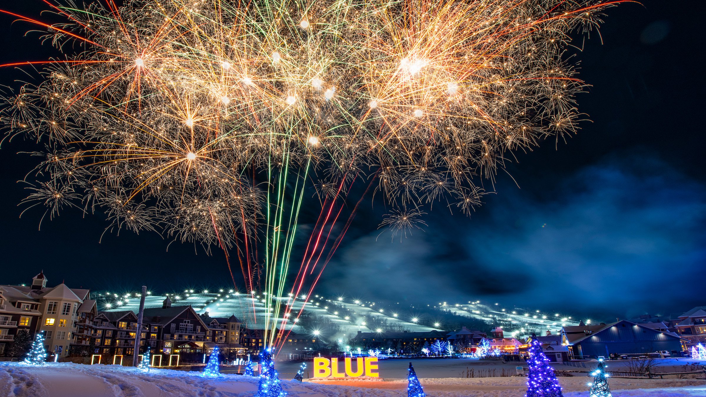Fireworks over Blue Mountain Village with Blue Mountain ski hill in background