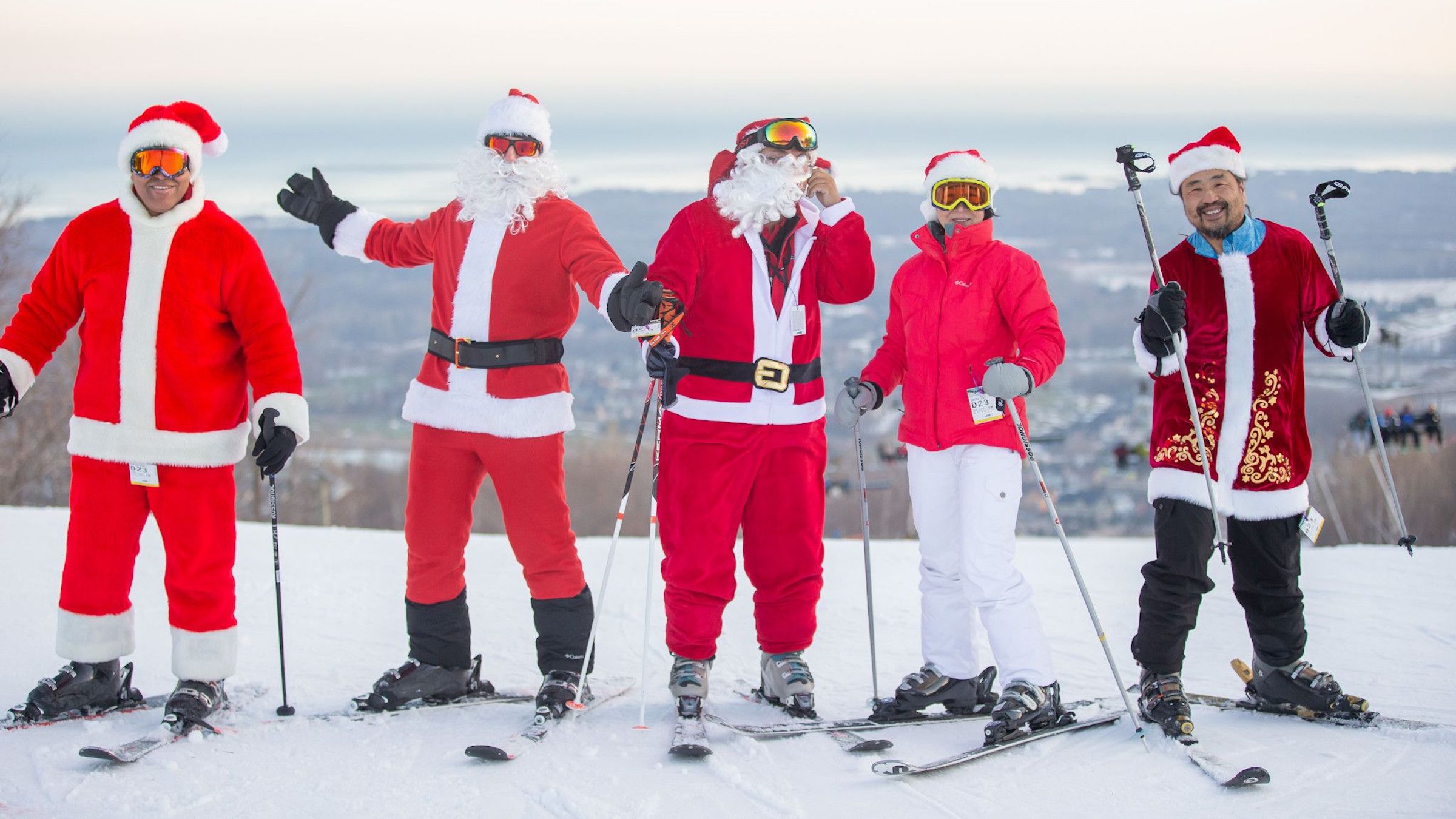 Group of skiers dressed as Santa at the top of Blue Mountain