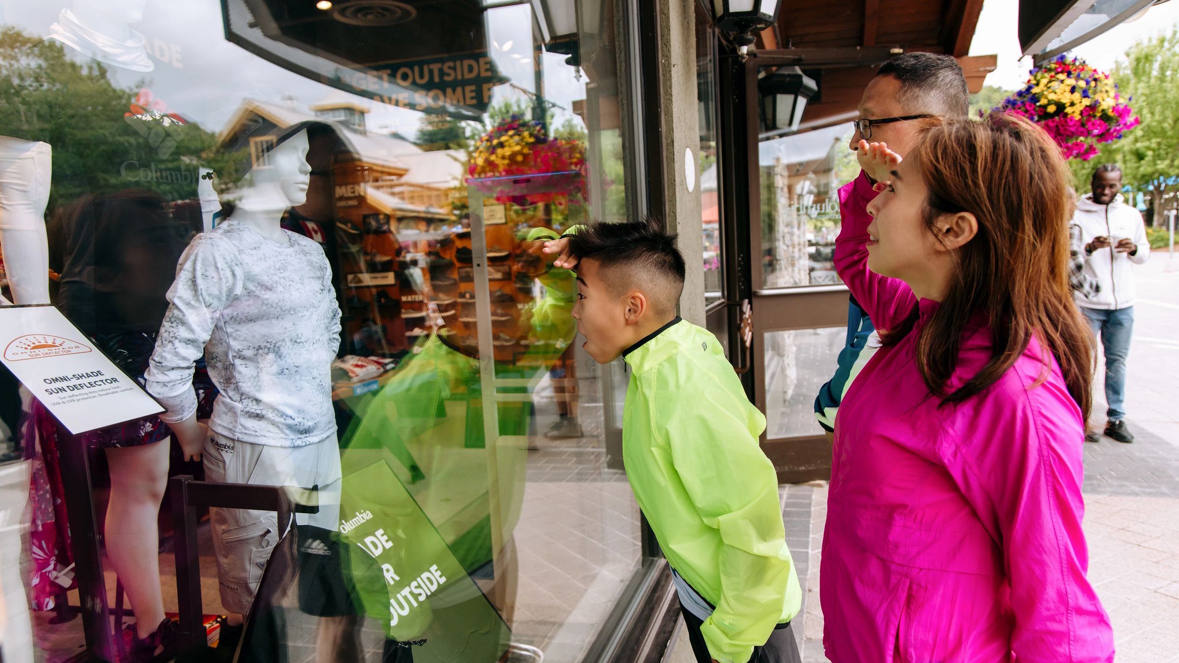 Family window shopping at Blue Mountain Village stores
