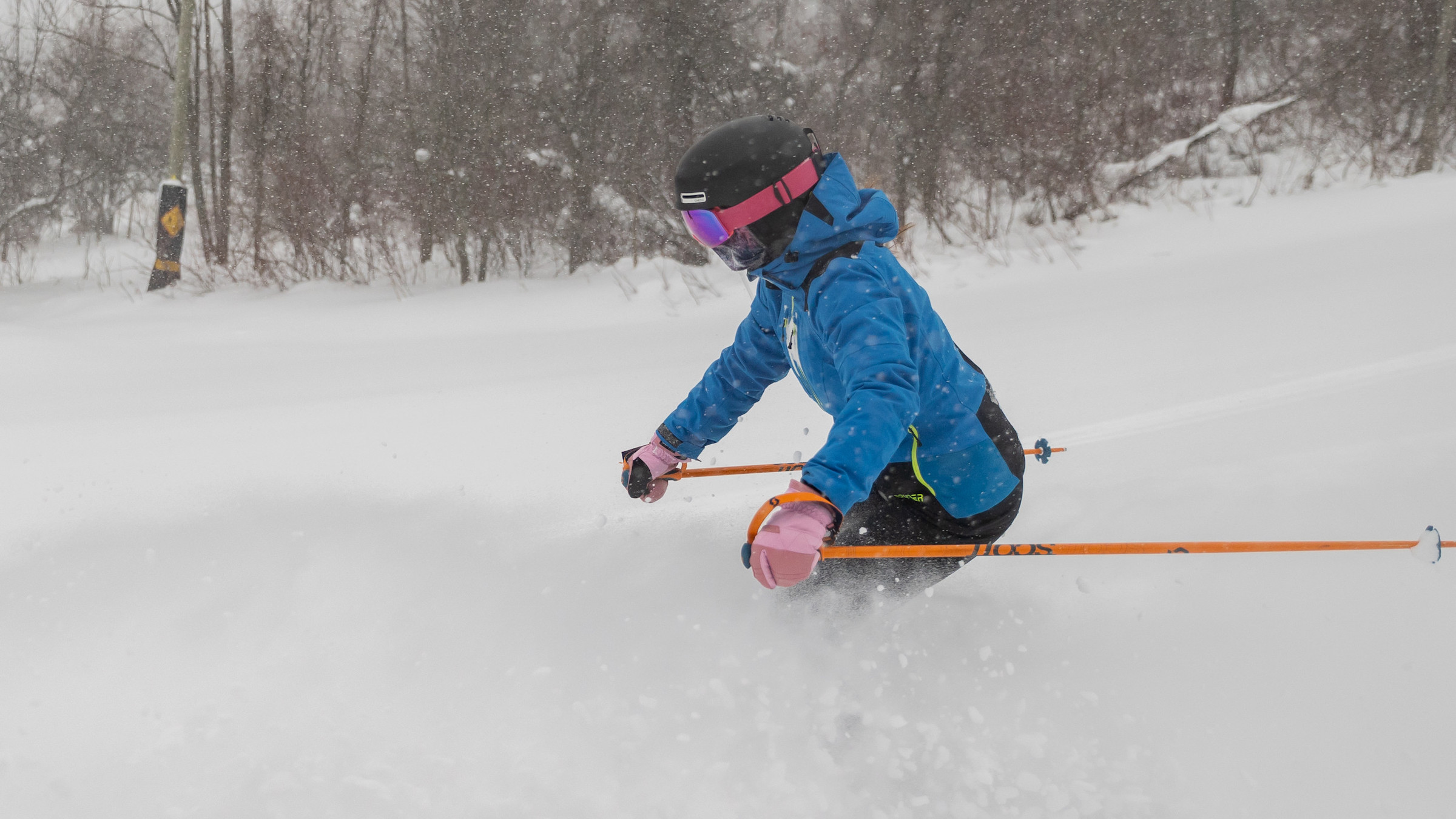 Skier going down Blue Mountain Hill on a Pow day