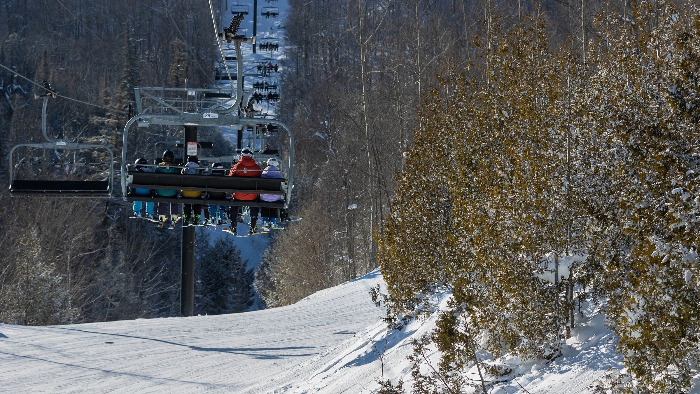 People on Blue Mountain Chairlift