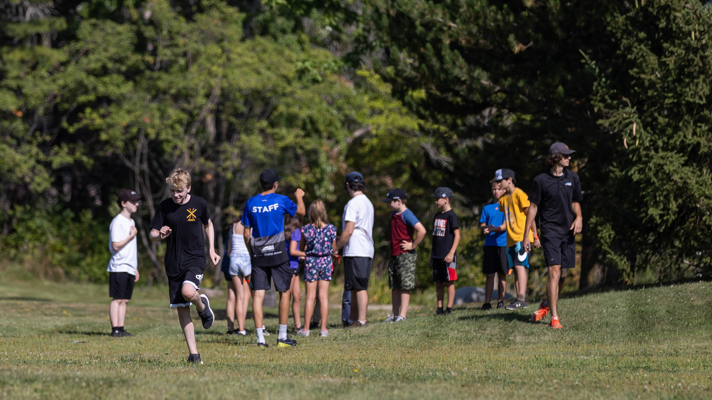 Kids playing during Summer Camp with Leader in Training Camp Program at Blue Mountain