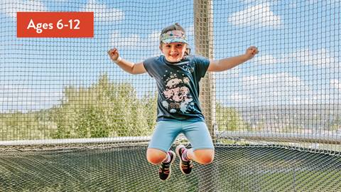 A joyful child jumping on a trampoline, recommended for ages 6-1