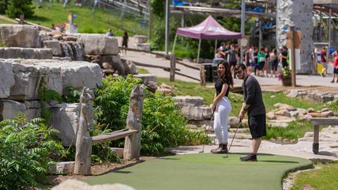 People playing on Cascade Putting Course