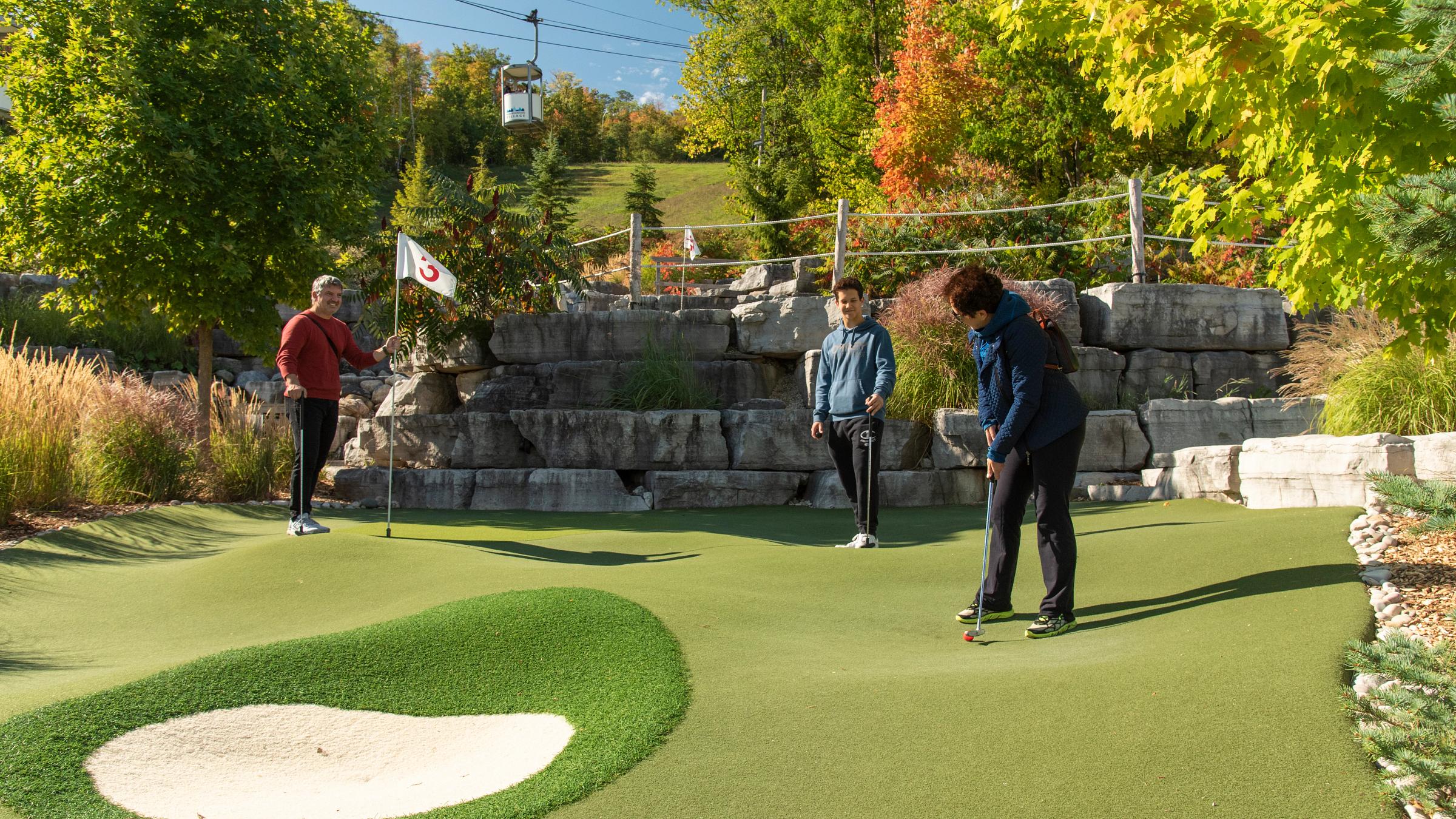 People on Cascade Putting