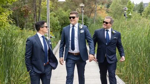 Groom and Groomsmen walking along path at Blue Mountain