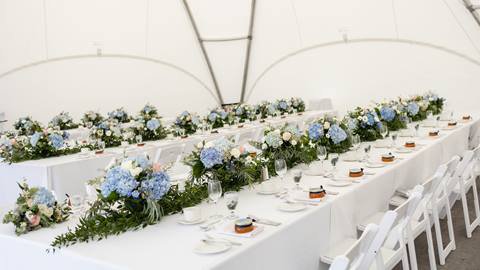 Wedding tables set up under tent at Blue Mountain Resort
