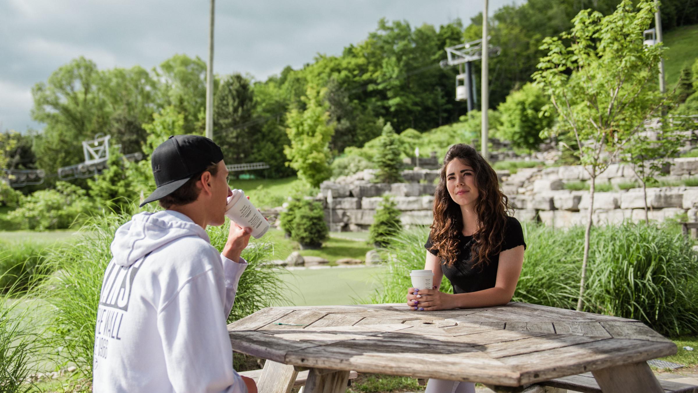 Young adults having coffee in the Village