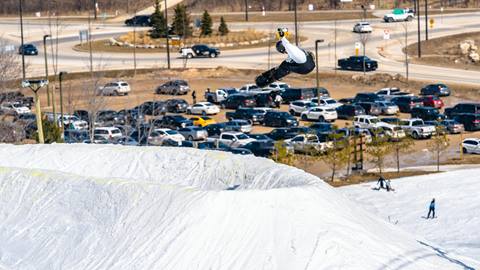 Skiing and Snowboarding in the Terrain Park Spring Pickle Park Party