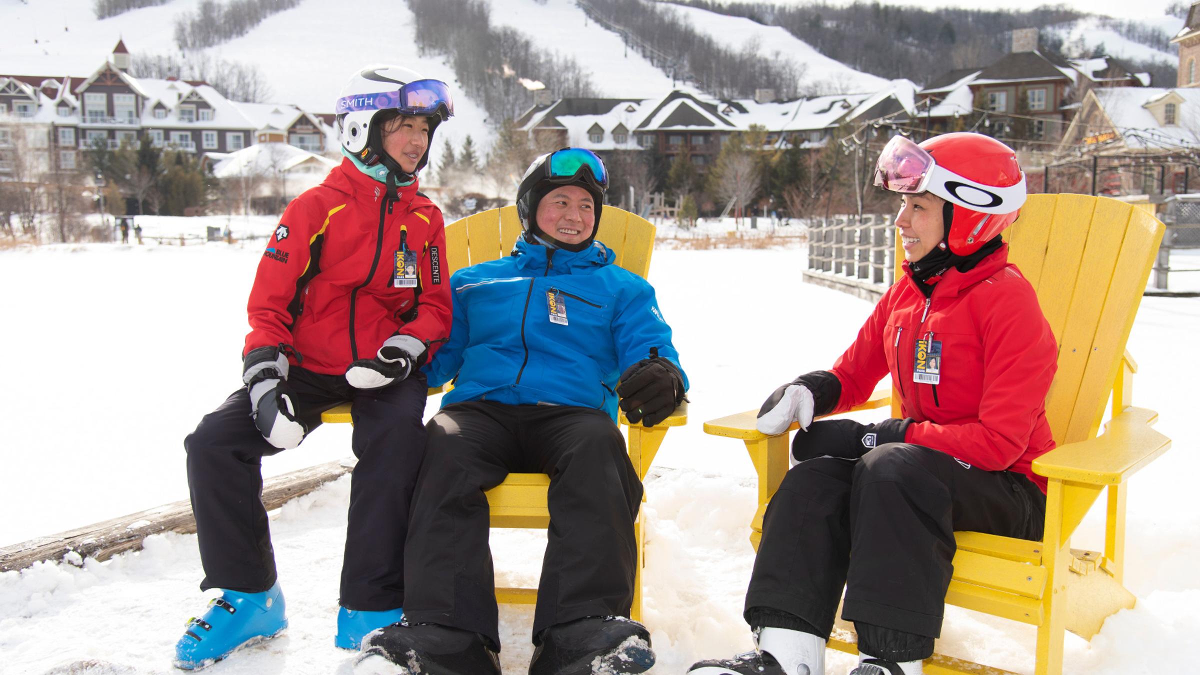 Winter lifestyle - individuals, couples and families interacting in ski and snowboard gear