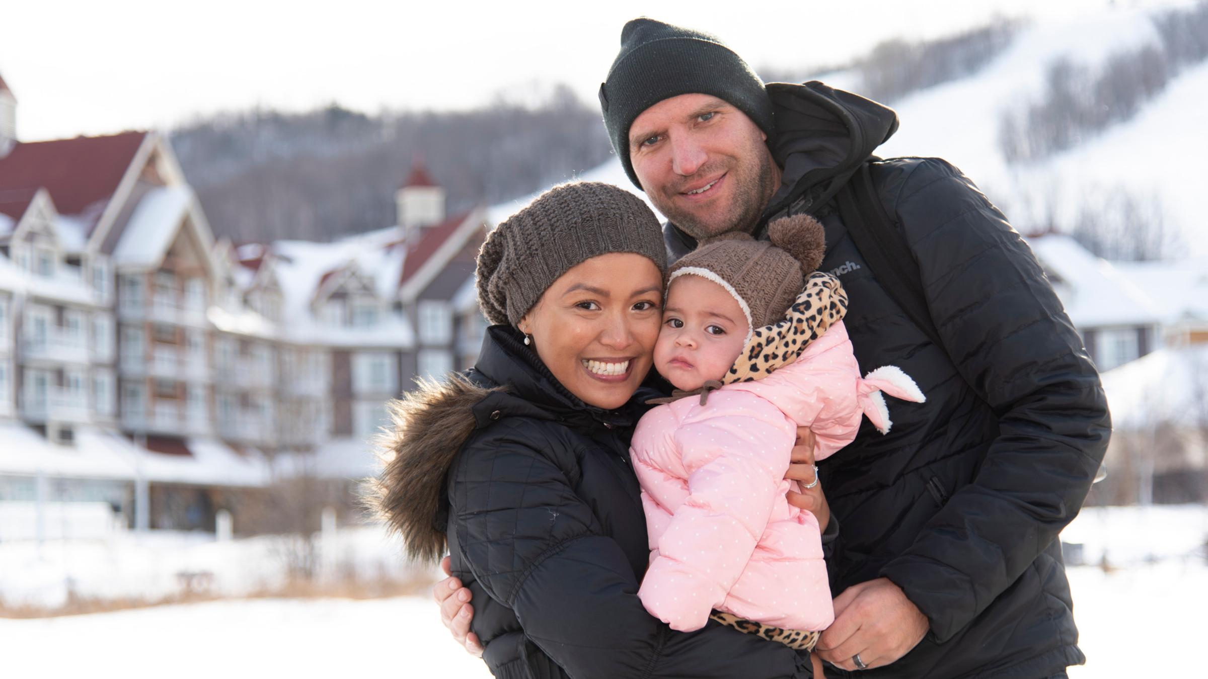 Winter lifestyle - individuals, couples and families interacting in ski and snowboard gear