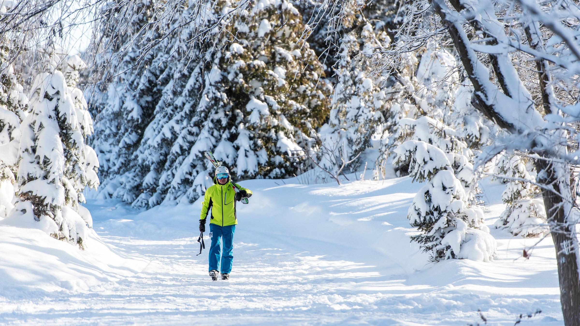 People on Hill in Winter
