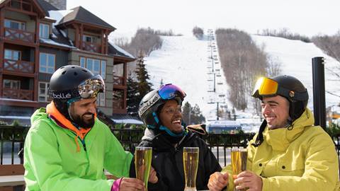 People on Hill in Winter